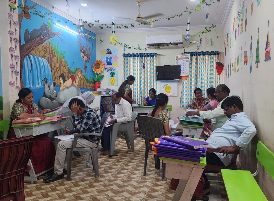 Teachers and parents in interactive academic session