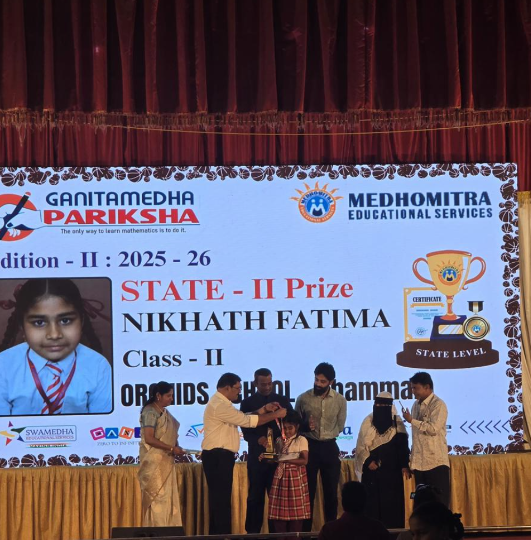 State 2nd Prize winner Nikhath Fatima of Class II receiving award on stage